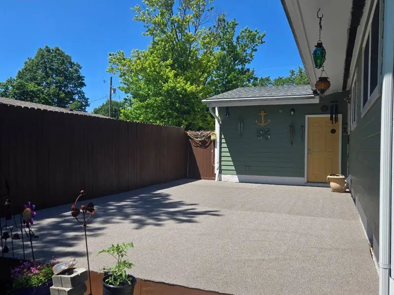 Waterproof coating applied to a deck surface